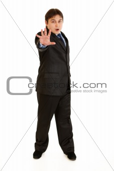 Full length portrait of scared young businessman
