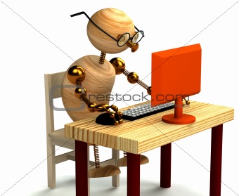 3d wood man working at computer