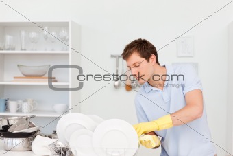 Man washing dishes 