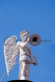 white angel with trumpet