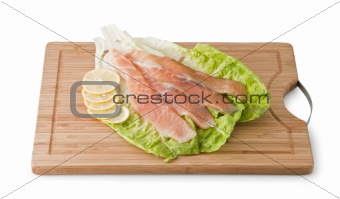 Assorted Trout on light green leaf with lemon