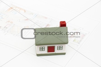 miniature house with various drafting