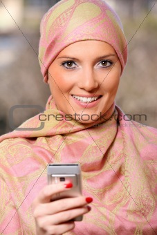 Arabic businesswoman with a cell phone