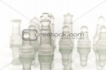 Close-up of glass chess on a glass countertop