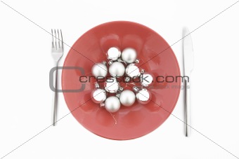 red plate with Christmas silver ball