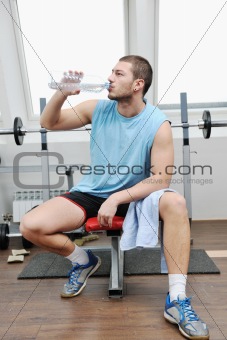 man drink water at fitness workout 