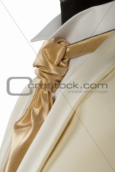 withe suit and gold tie