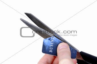 Woman cutting cut credit card - isolated