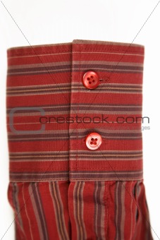 red cuff from striped shirt