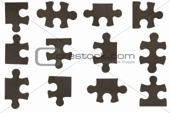 different black puzzle pieces
