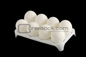 Eight white eggs in carton
