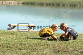 Boys playing in the grass