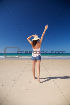 happy straw hat woman at beach