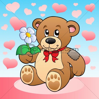 Teddy bear with flower and hearts