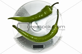 Green pepper on food scale
