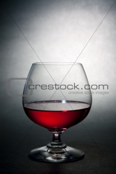 Luxury red liqueur on balloon crysal glass