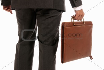 Unrecognizable businessman back with suitcase isolated on white background