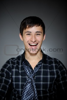  Handsome man in funny shirt and tie laughing