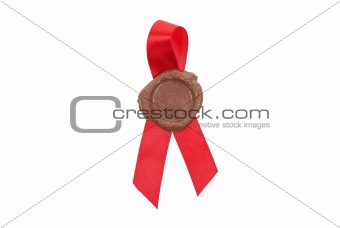 Round red wax seal on a red ribbon