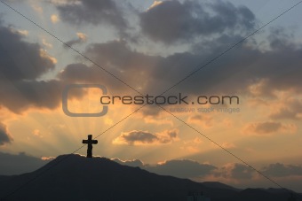 Cross on Dramatic Sunset