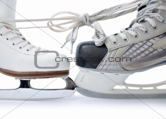 Ice skates tied against each other