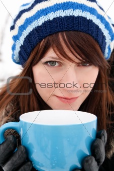 Girl holding a cup