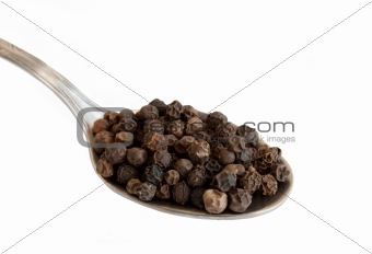 Tea spoon with black pepper