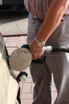 Man pumping gas