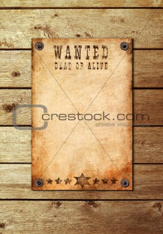 Vintage wanted poster on a wooden wall