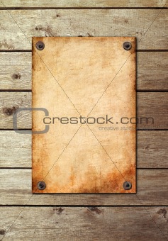 Vintage page on a wooden wall