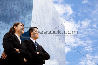 business man and woman  looking away