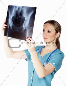 Female doctor checking xray image 