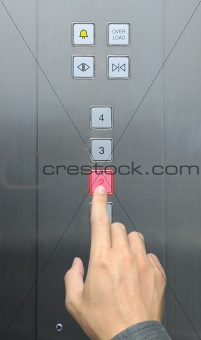 businessman hand press 2 floor in elevator