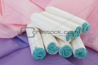 Sanitary napkins and tampons