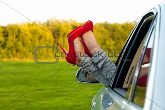 Red pumps out of the car