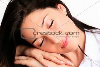 Young happy woman holding her head