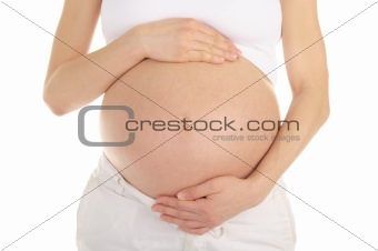 hands supporting the belly a pregnant woman