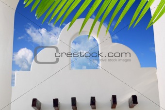 Mexican architecture white archs blue sky