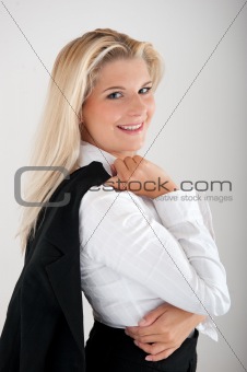 pretty business woman in a suit and white shirt