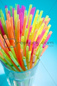 Multicolor flexible straws in the glass closeup