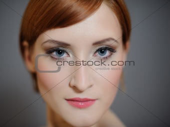 Portrait of pretty woman with pure healthy skin