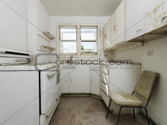 Empty dirty kitchen.