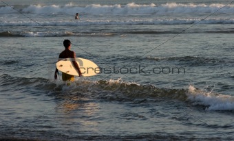 Surfer on the Kuta beach, Bali