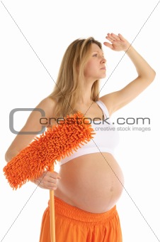 pregnant woman with a mop looks forward