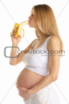pregnant woman is sexually bites banana