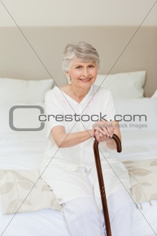 Retired woman with her walking stick 