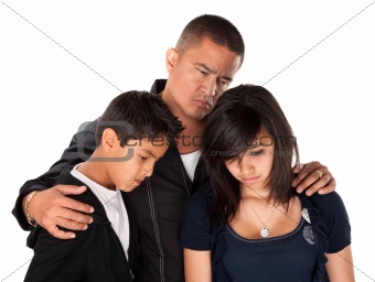 Father and Children Looking Sad