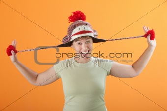 Woman Pulling Her Hat