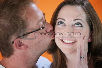 Man Kisses Woman
