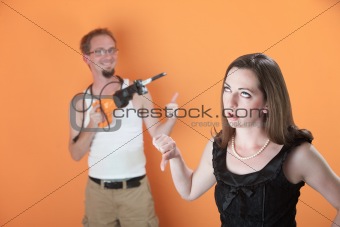 Woman Unhappy with Man's Work